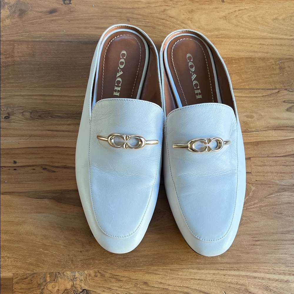 Coach Women's Cream Mules with Gold Accent